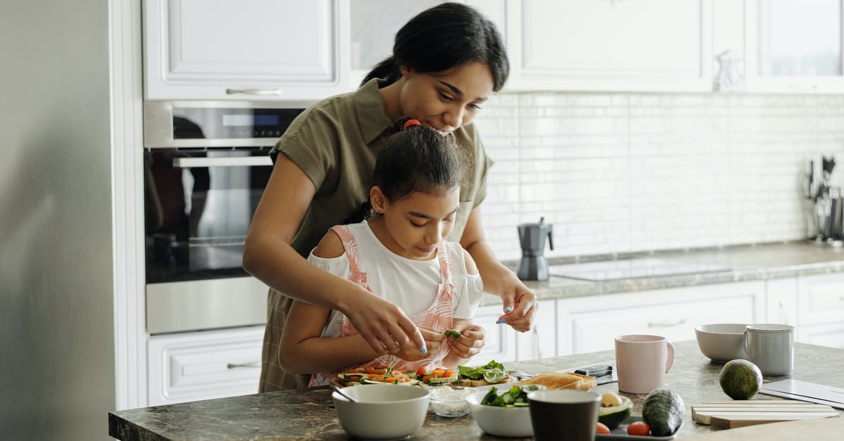 Tomato paste - why logically? - Mother and Daughter Preparing Avocado Toast