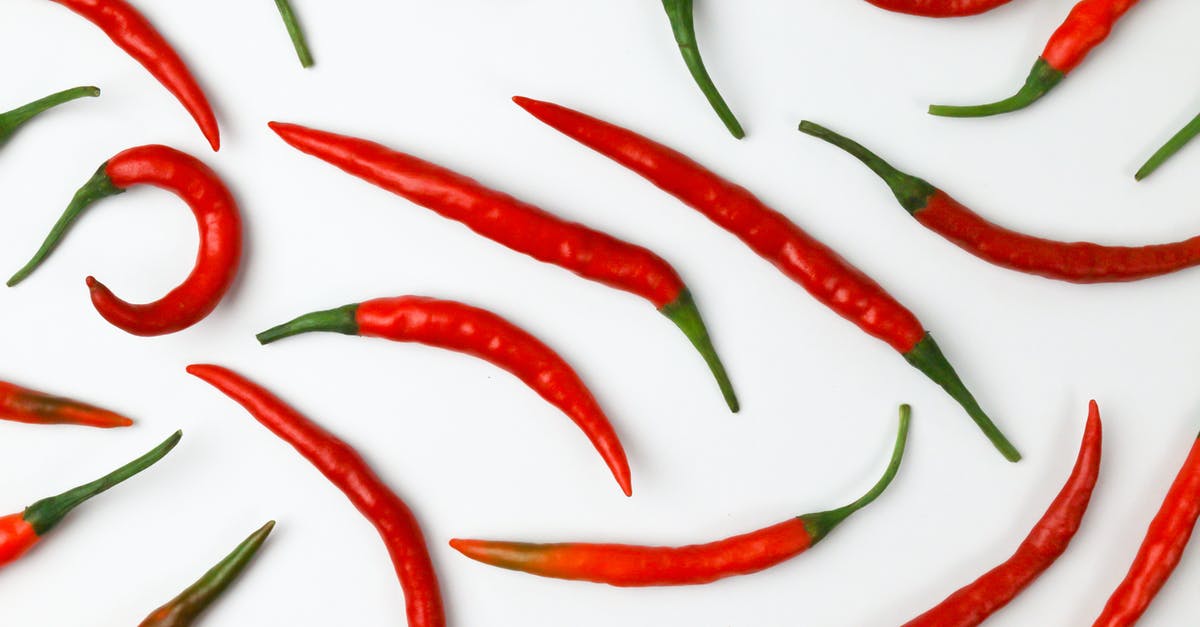 Too much cayenne chilli pepper - Fresh Red Chili Peppers in Close-Up Photography