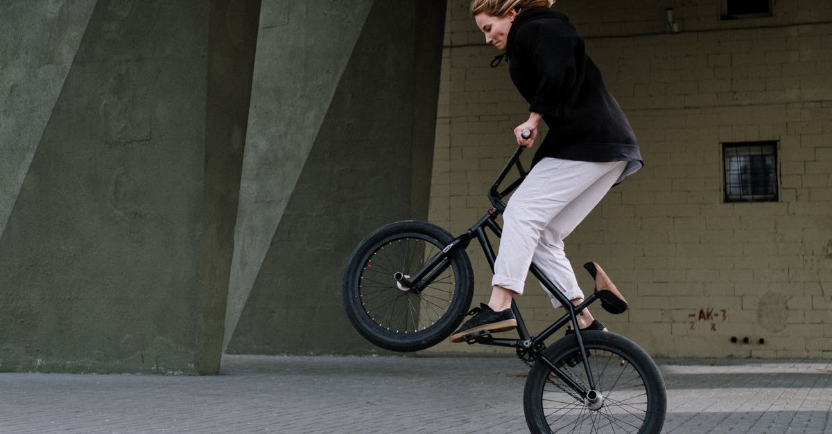 Tricks for removing sausage casing? - Woman in Black Jacket Riding Bicycle