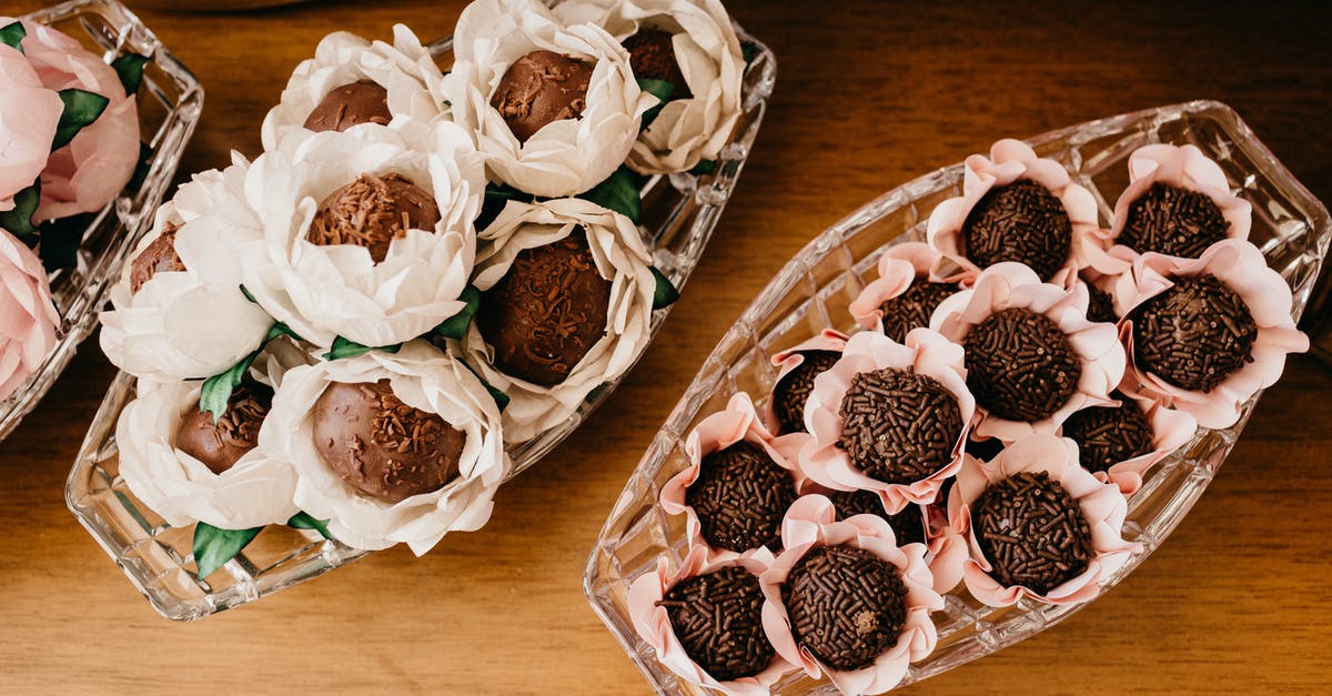 Truffles: how do I pick between buying truffle or truffle oil? - Assorted delicious chocolate truffles in decorative flowers