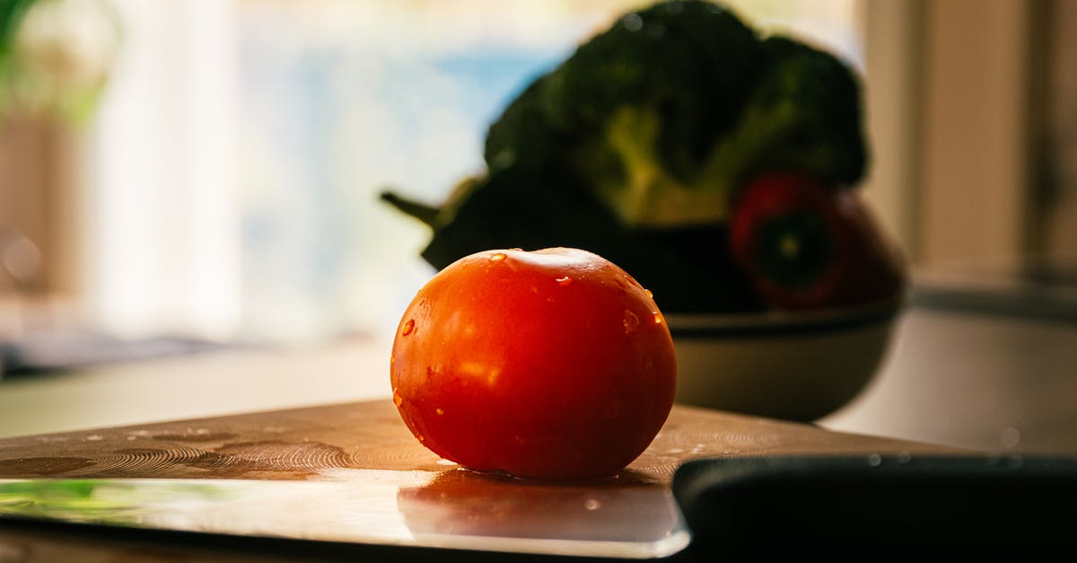 Turn Passata Into Tomato Paste? - Red Tomato on Brown Wooden Chopping Board