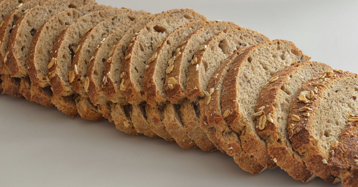 Turning toasted, non-crumbly whole wheat bread into breadcrumbs - Sliced on Bread on White Surfcae