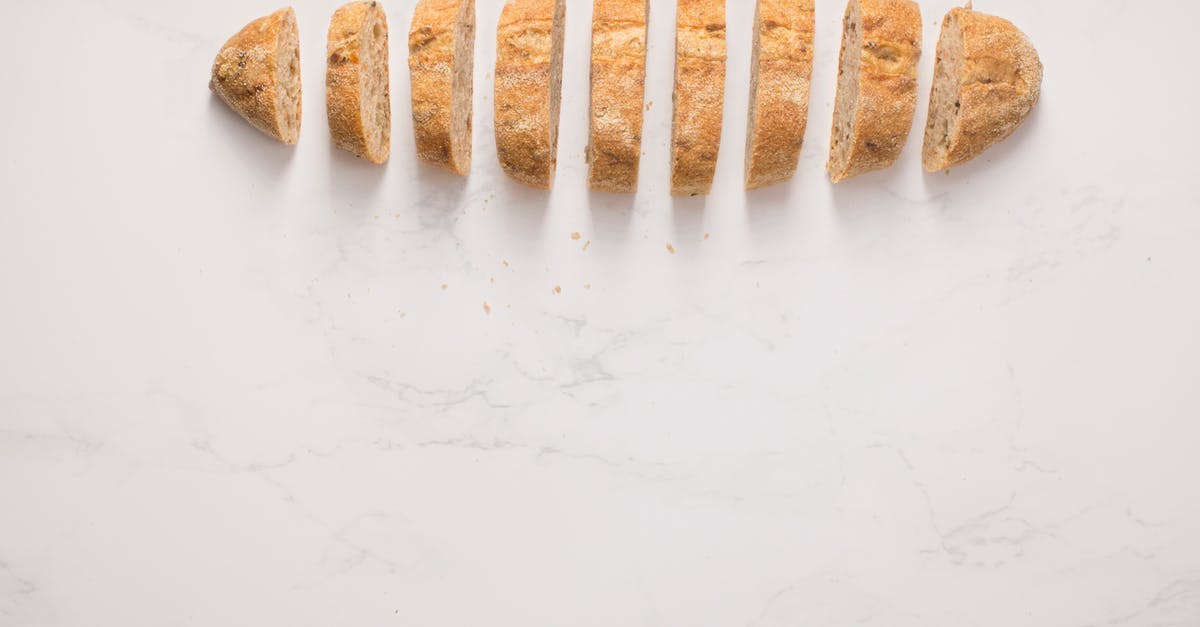 Turning toasted, non-crumbly whole wheat bread into breadcrumbs - Photo of Sliced Breads