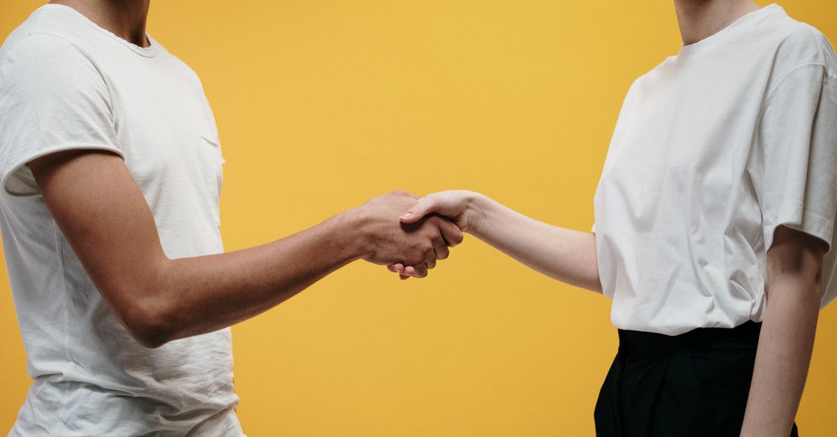 Under burnt layer prevention for briyani [duplicate] - People Making Handshake As A Sign Of Success