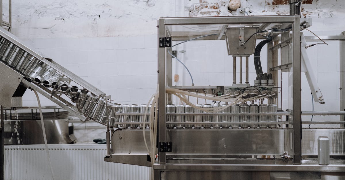 underfilled whipper canisters - Aluminum Cans Passing Through the Assembly Line