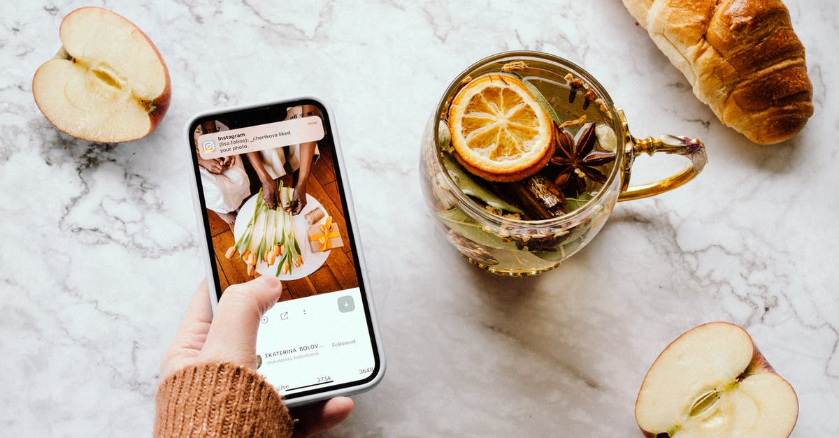 Upside-Down Lemon Squares? - Woman Taking Photo with her Phone of Green Tea with Lemon 