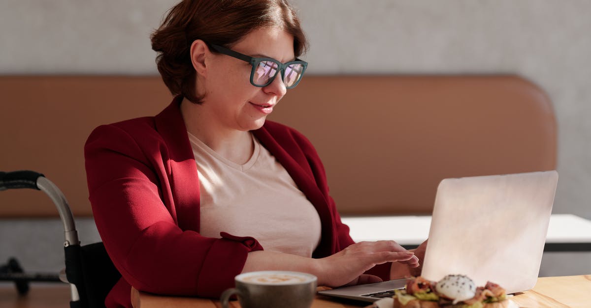 Using a browning dish to microwave meat - Photo of Woman Wearing Eyeglasses While Using Laptop