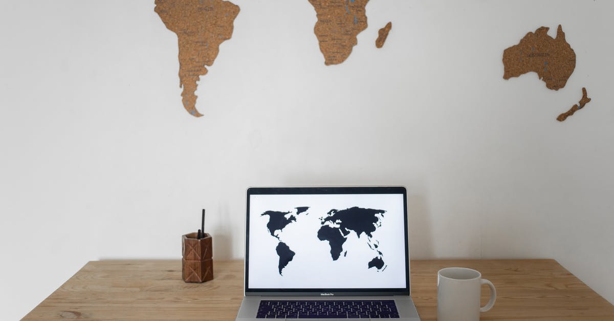 Using a ceramic honing rod for Global knives? - Black world map on laptop screen and ceramic cup with pen container placed on table against silhouettes of continents