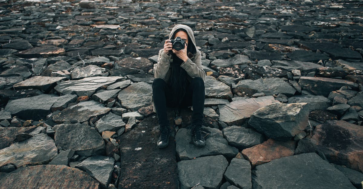 Using cueritos (Pork Rinds) for ground beef - Concentrated photographer taking picture on stones