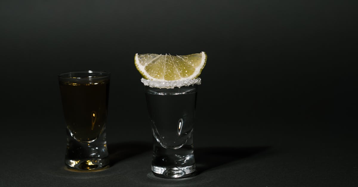 Using dark rum instead of white rum - Clear Drinking Glass With Sliced Lemon