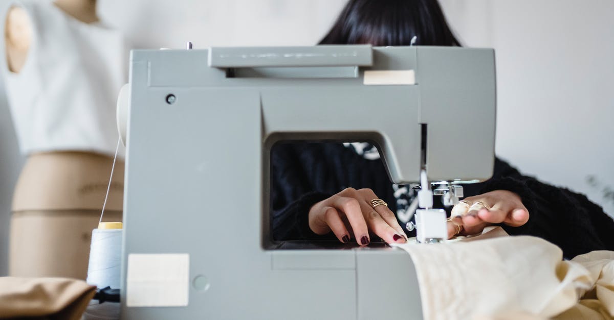 Using Frozen Fries as a Component: How to Dress Them Up? - Anonymous seamstress sewing on machine in atelier