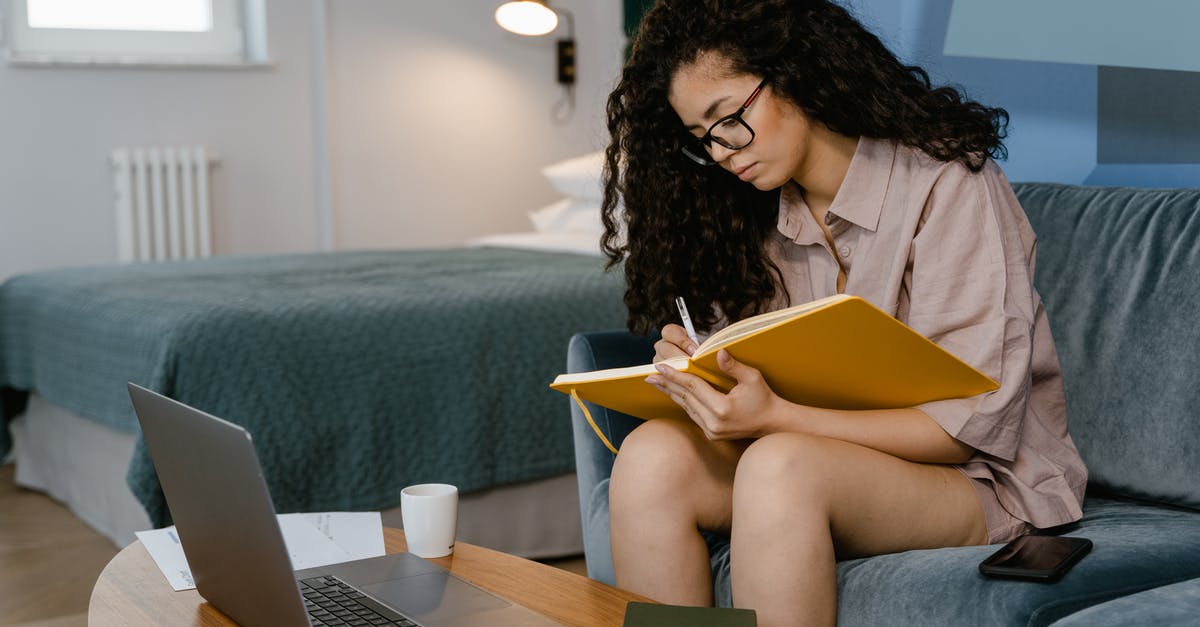 using icing with buttercream to write with - A Young Woman Writing in a Notebook While Sitting on a Couch