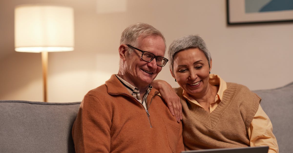 Using older frozen vegetables - Man and Woman Sitting on Sofa While Looking at a Laptop