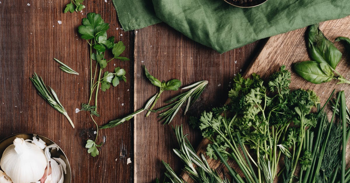 Using parsley and thyme in a brine - Close-Up Photo Of Green Herbs