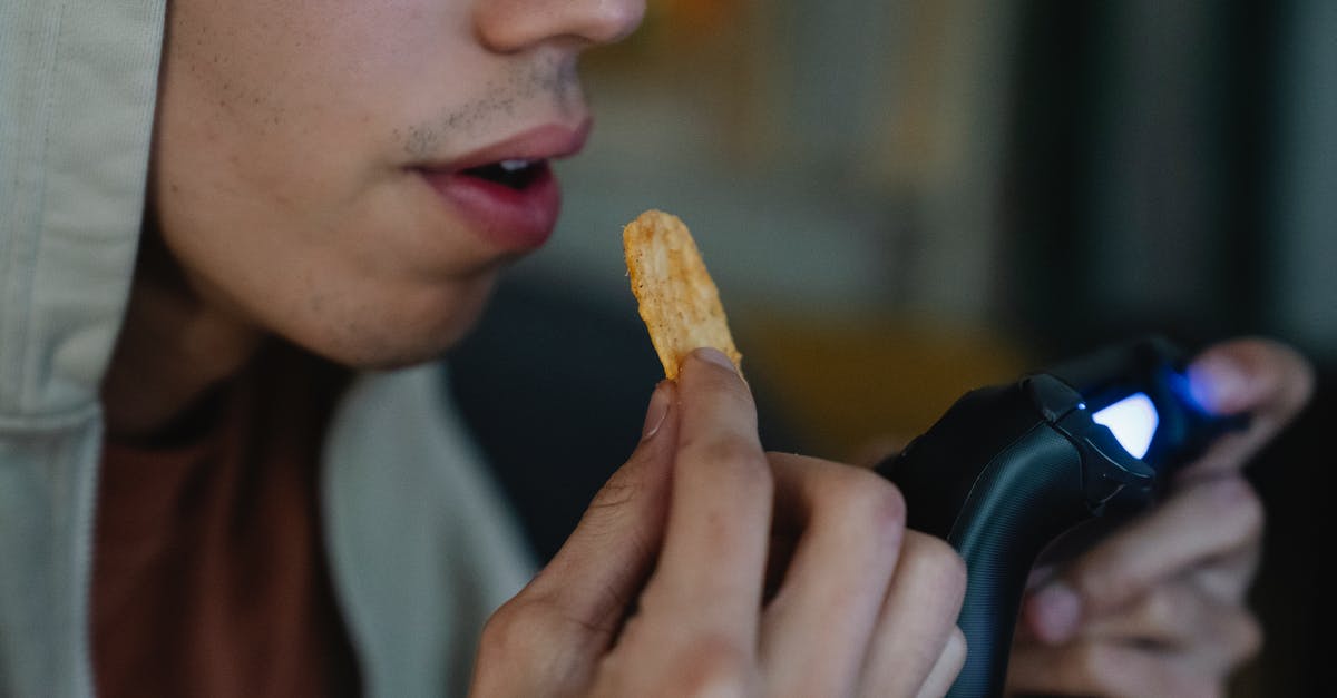 using potato starch to thicken jam - Crop gamer with potato chip and gamepad at home