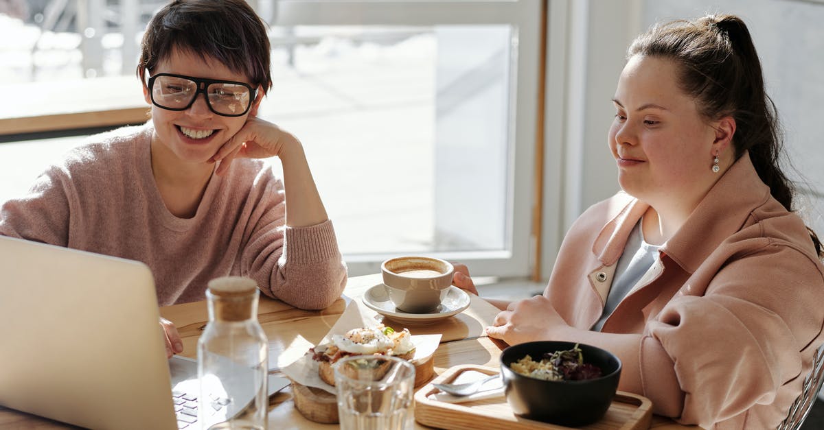 Using salmon in 2 days, freezer or fridge? - Happy Young People Watching On A Laptop