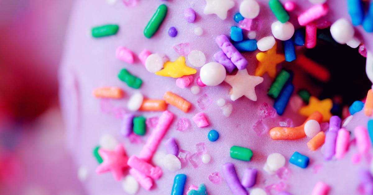 Using unrefined sugar to make candy - Pink Doughnut with Colorful Sprinkles inTilt-shift Lens