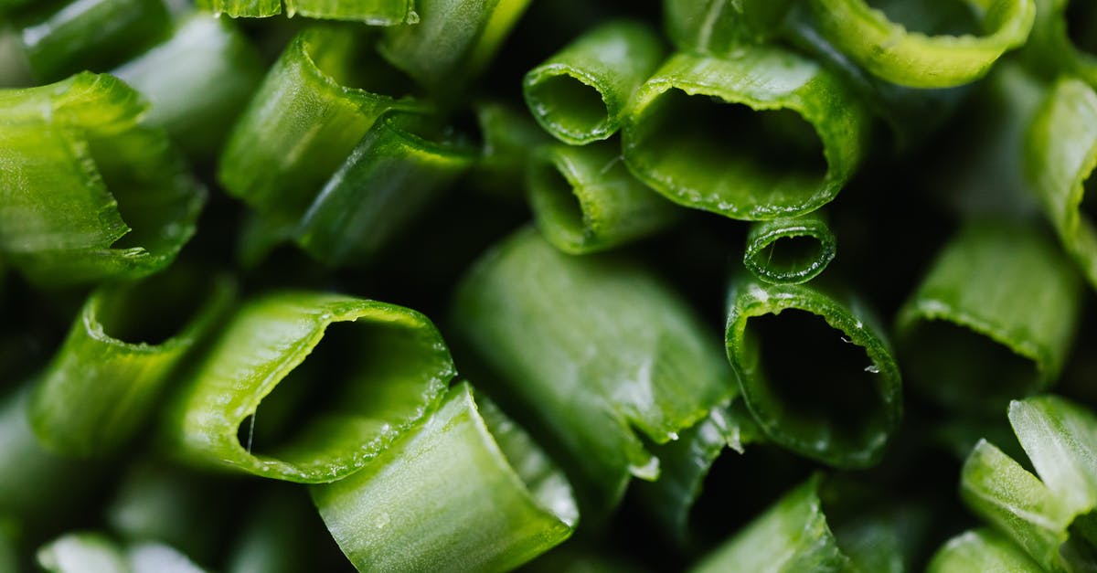 Using Vinegar to Cut down on Spice - Fresh green onion prepared for salad