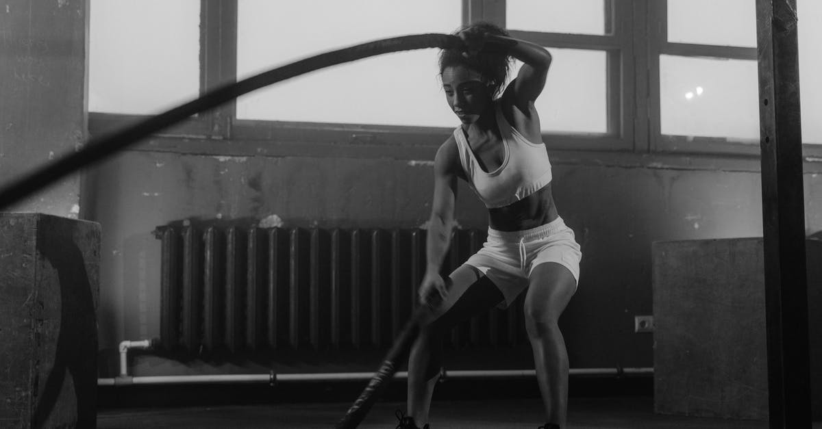 Using xanthan gum - Grayscale Photo of a Woman Using Battle Ropes