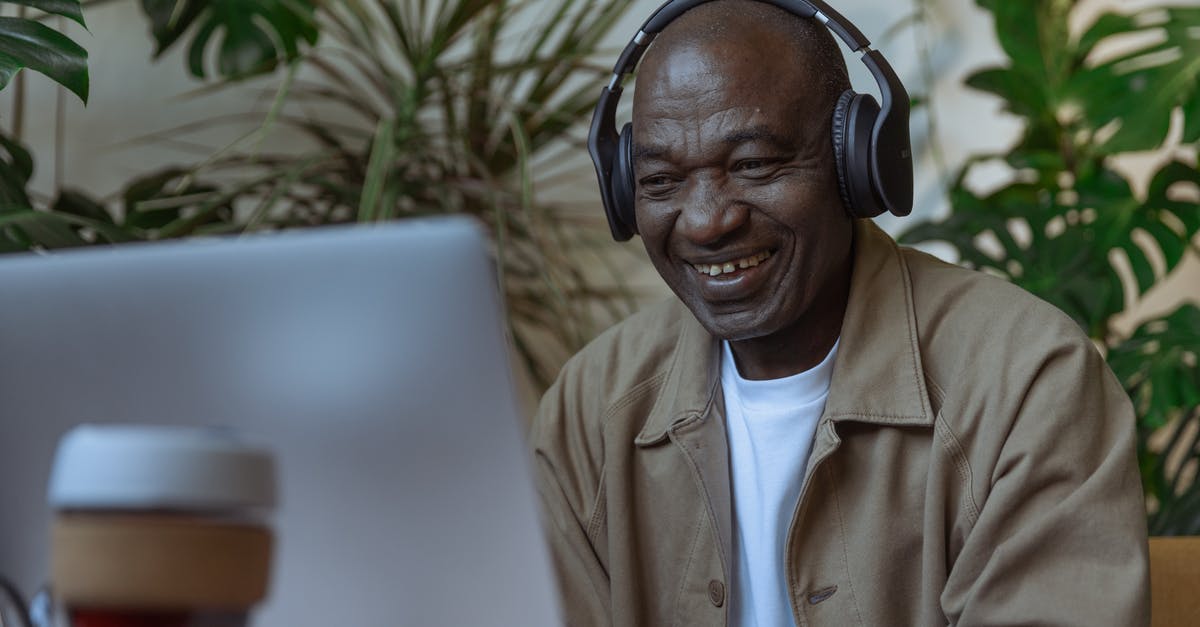 Veloute consistency after being refrigereted - Photo of an Old Man Looking at the Laptop