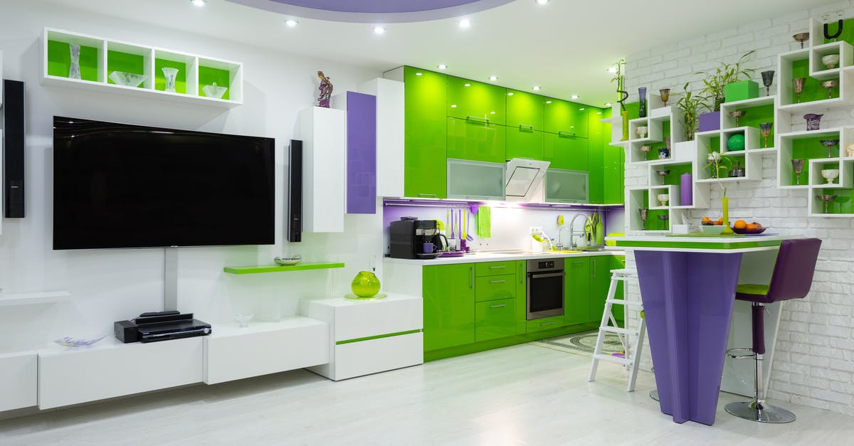 Very unusual kitchen tools - Bright green and purple furniture in contemporary studio apartment with kitchen area