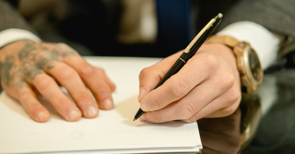 Vinegar choice for pickling - Person Holding Black Pen Writing on White Paper