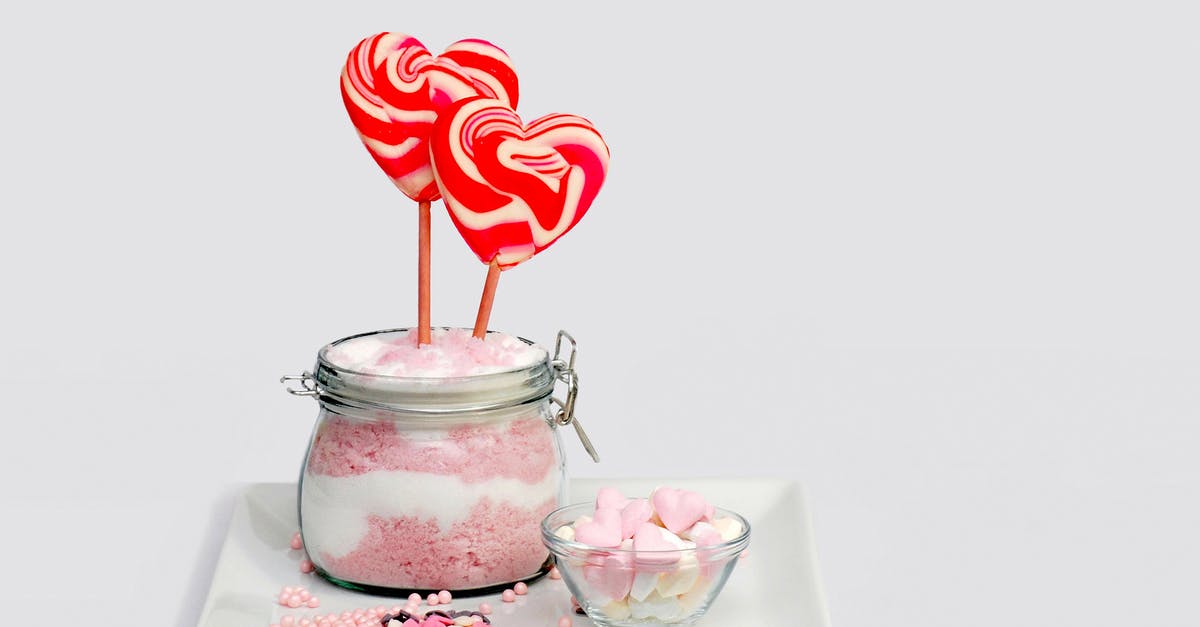 vinegar in lollipops - Pink and Grey Heart Shape Lollipop on Clear Glass Jar