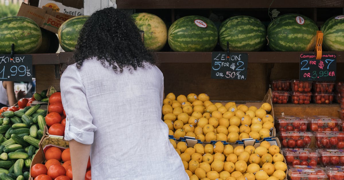 Watermelon - picking and managing them during heat - Woman in White Polo Standing on Fruit Store