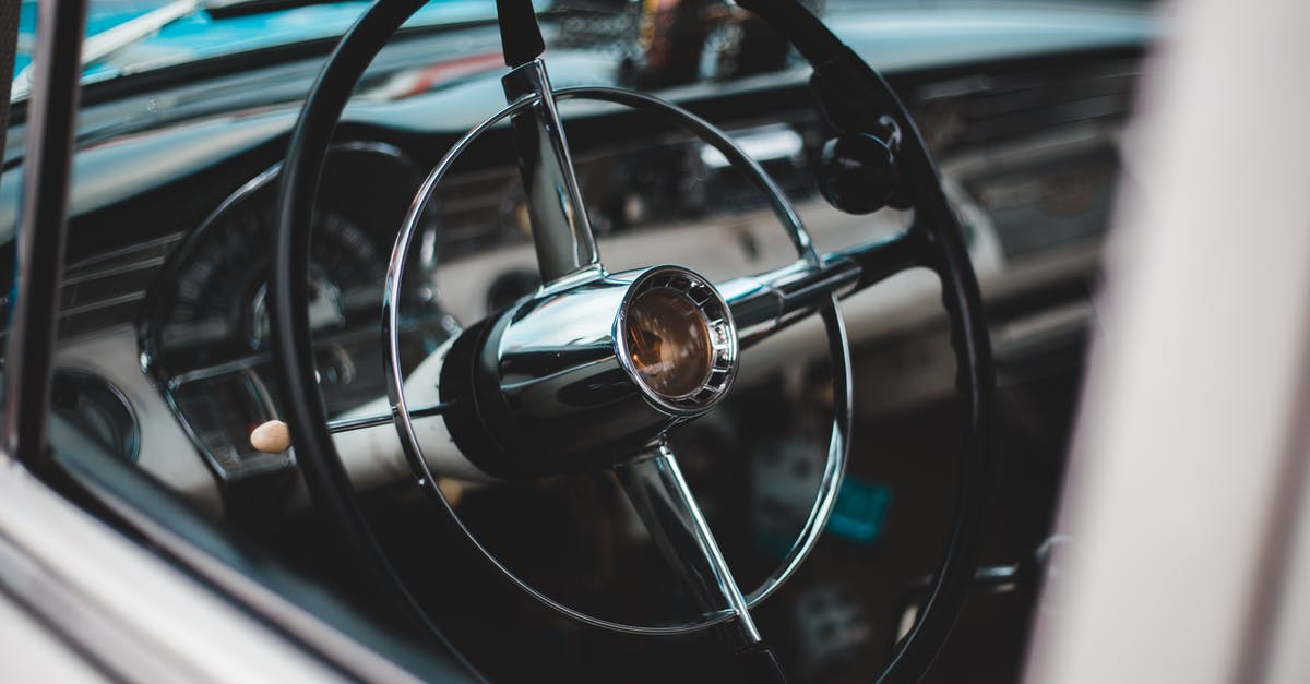 Were are they? Are there even any? [closed] - Closeup of stylish interior of vintage car with black metal steering wheel and dashboard