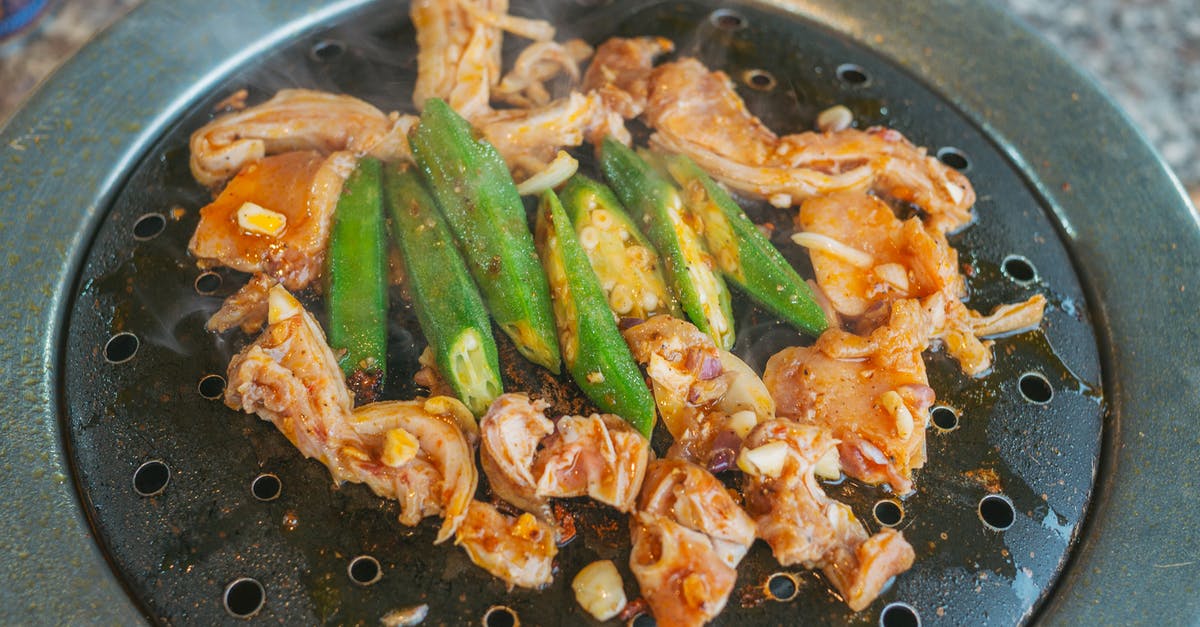 What's a pan and what's a pot? - Cooked Food on Round Iron Barbecue Grill Plate