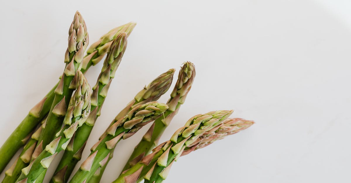 What's the best way to clean a salad spinner? - Fresh ripe asparagus pods in bunch