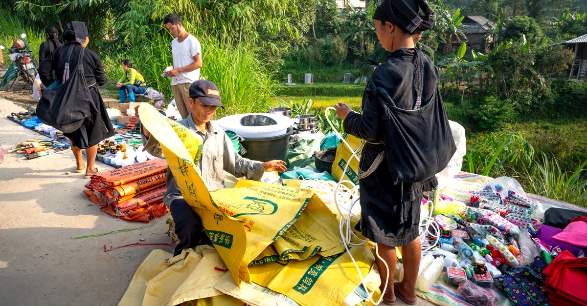 What's the best way to store (freeze) purchased ground beef? - Asian people standing near indigenous market with goods on ground