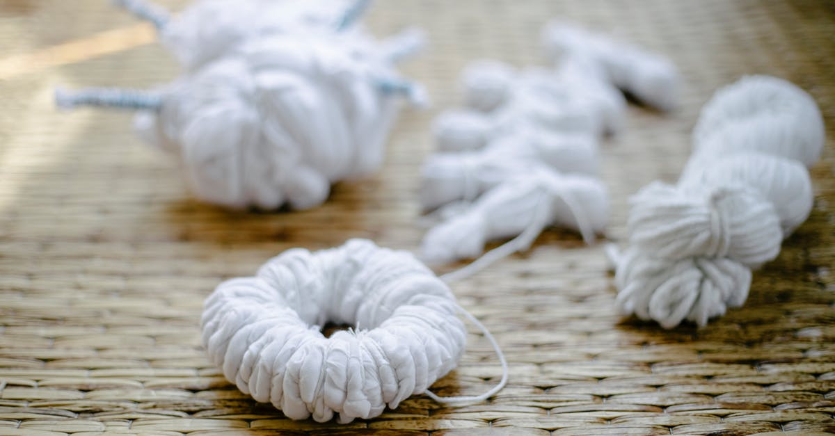 What's the difference between heirloom and direct-set yogurt cultures? - Tied fabrics scattered on rattan surface before creating shibori pattern