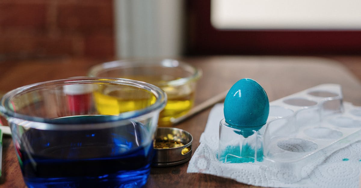 What's the purpose of adding water to an egg wash? - Blue Egg on Clear Plastic Tray