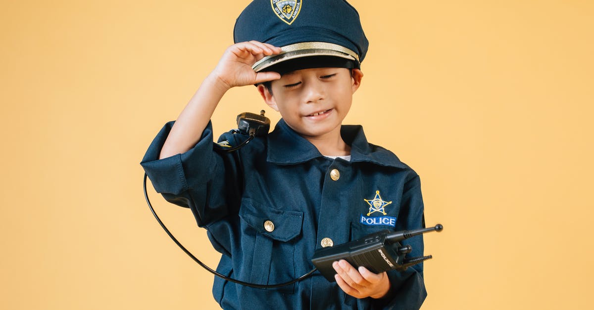 What's the purpose of clarifying butter? - Ethnic kid in police uniform in studio