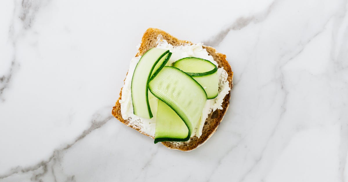 What's the role of bread in pickling cucumbers? - Bread With Sliced Cucumber and Cream