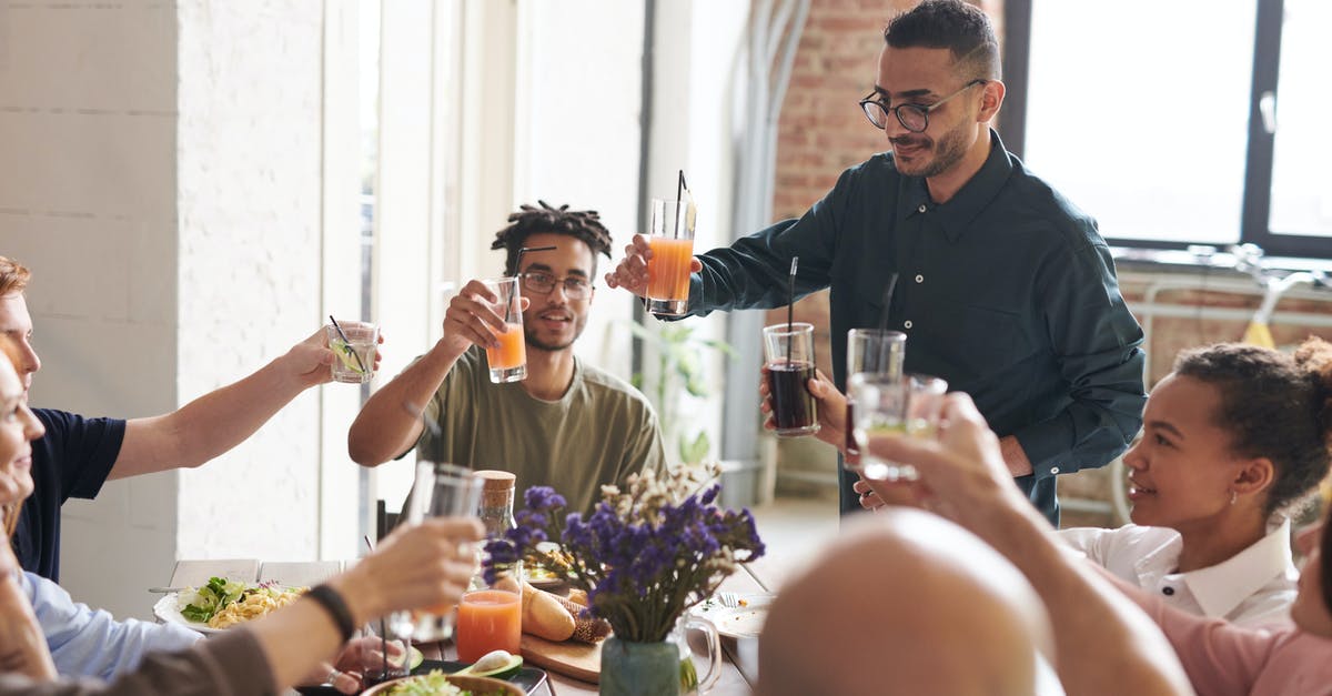 What's the secret to getting restaurant-quality frozen drinks at home? - Group of Friends Making Toast