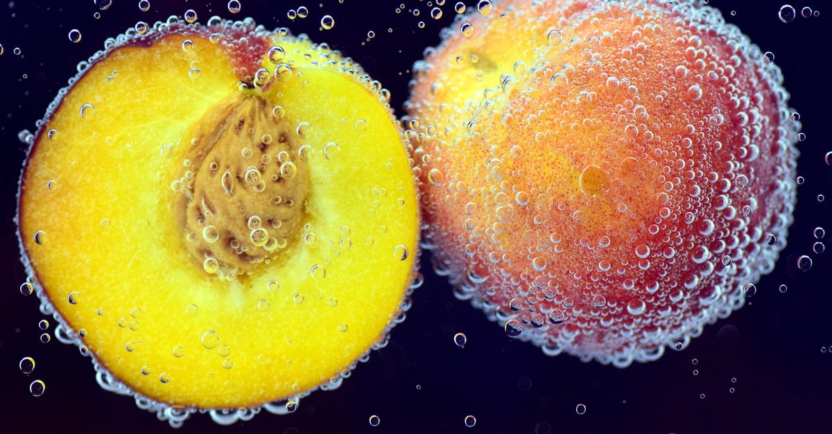 What's this yellow plum-like fruit with a spiky stone? West Africa - Slice of Ripe Apple