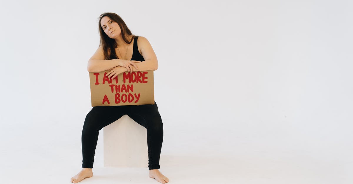 What am I doing wrong with my Kool-Aid pickles? - A Woman Showing a Placard