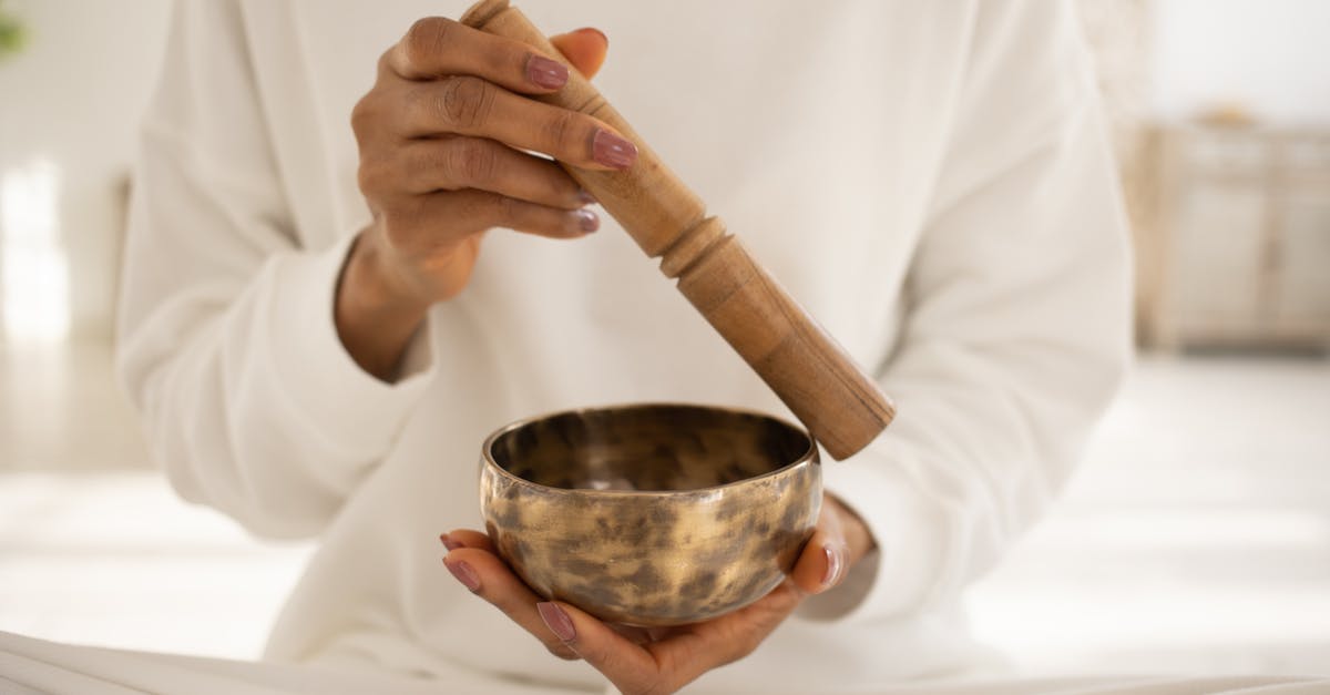 What are alternate uses for leftover buttermilk? [closed] - Close-Up Shot of a Person Using a Singing Bowl