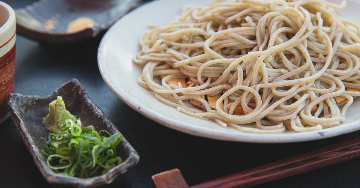 What are ‘fresh noodles’ in a salad - Appetizing pasta near wakame and wasabi