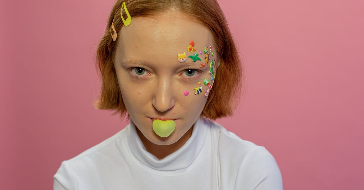 What are some alternatives to xanthan gum for stabilizing mayonnaise? - Lady with animal stickers on face blowing bubble with gum
