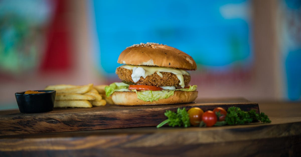 What are some good ways to treat frozen vegetables such that they behave like fresh vegetables when stir frying them? - Chicken Burger With Fries