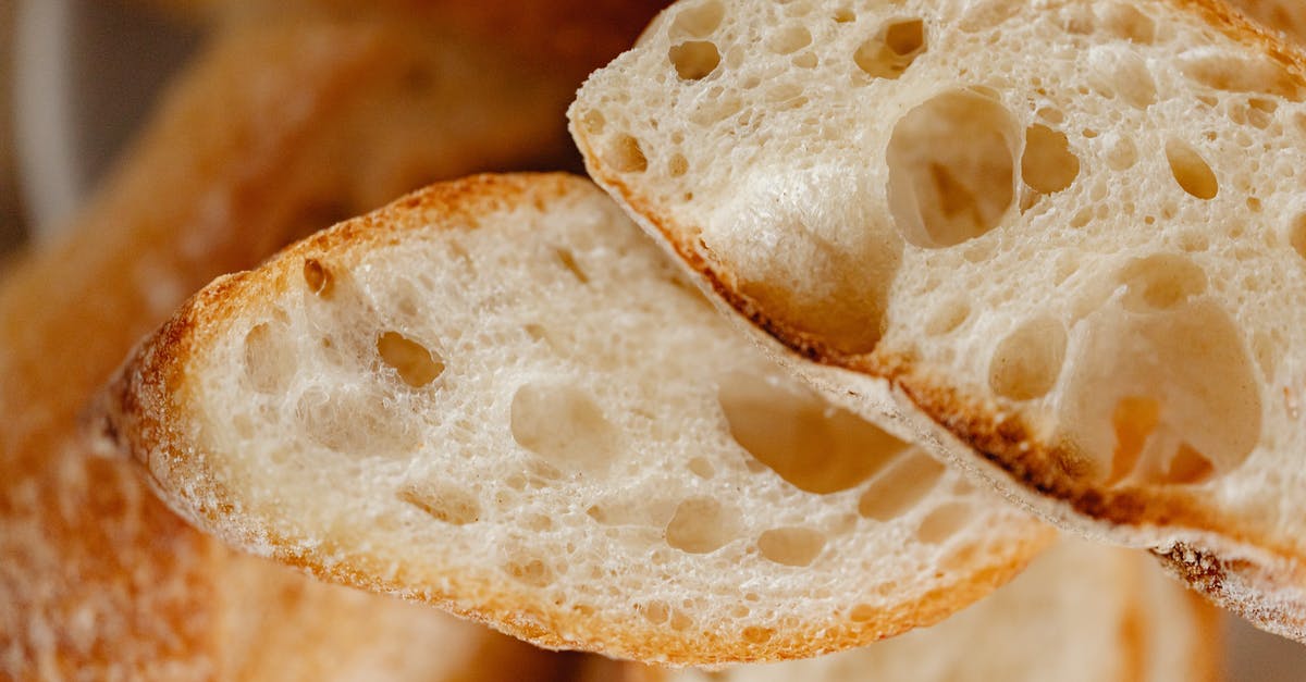 What are the breads with big holes and small holes called? - Macro Shot of a Bread with Holes