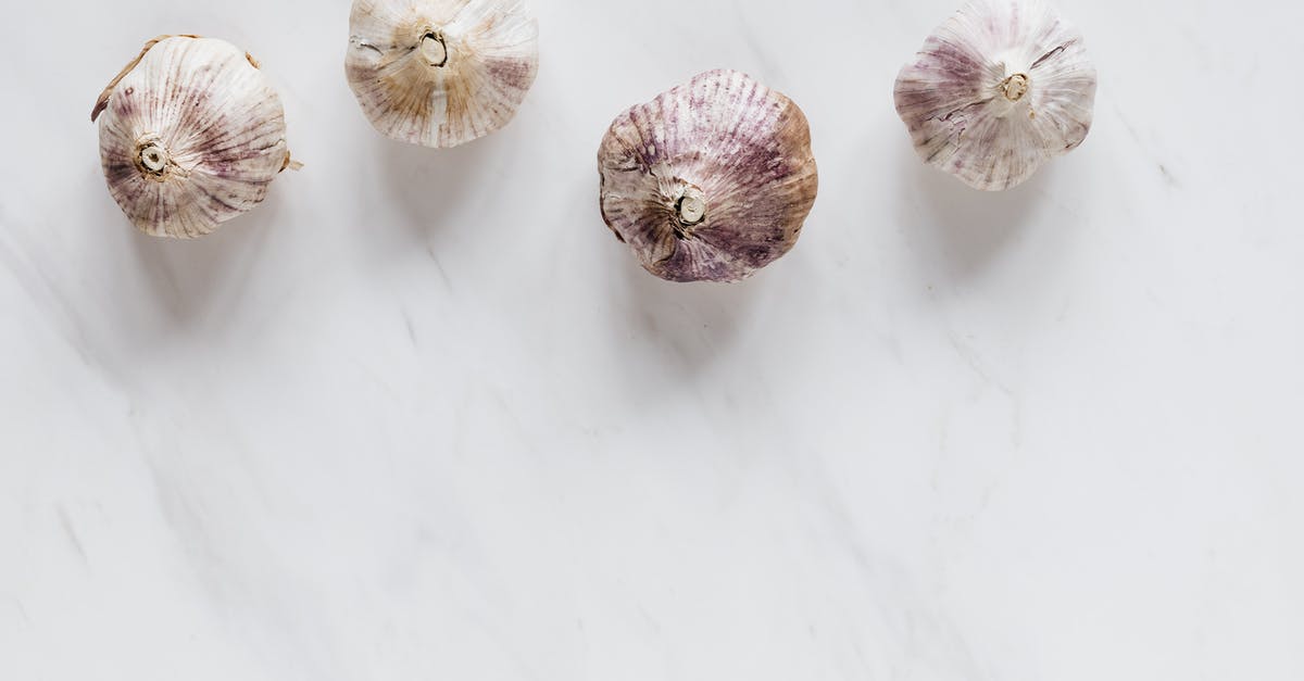 What are the criteria for 'Recipes for Space'? [closed] - Ripe raw garlic bulbs on marble table