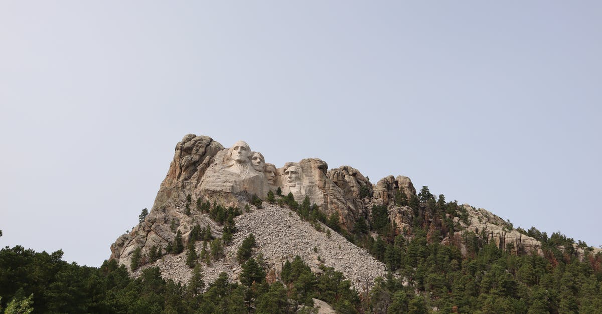 What are the four cheeses generally used in"four-cheese" pizzas? - Green Trees Near Rocky Mountain