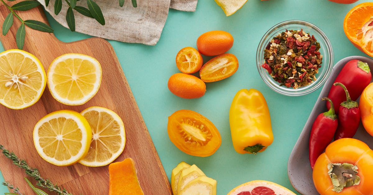 What are the key differences between lemons and meyer lemons? - Sliced Orange Fruit Beside Sliced Orange Fruit