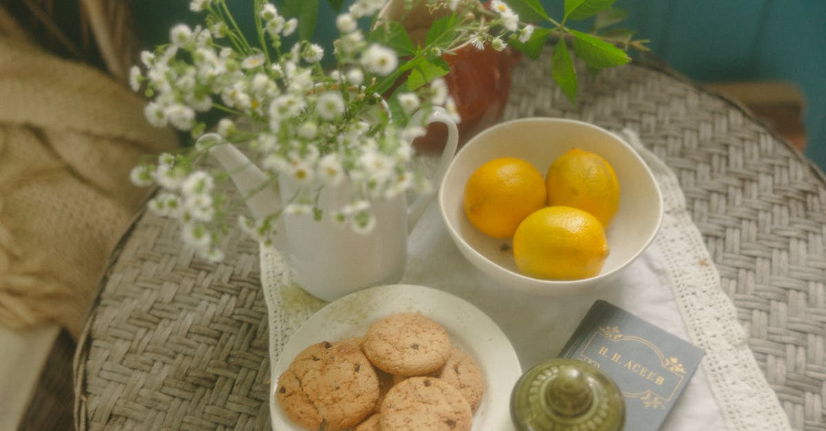 What are the key differences between lemons and meyer lemons? - Cookies on a White Plate and Lemons in a Bowl