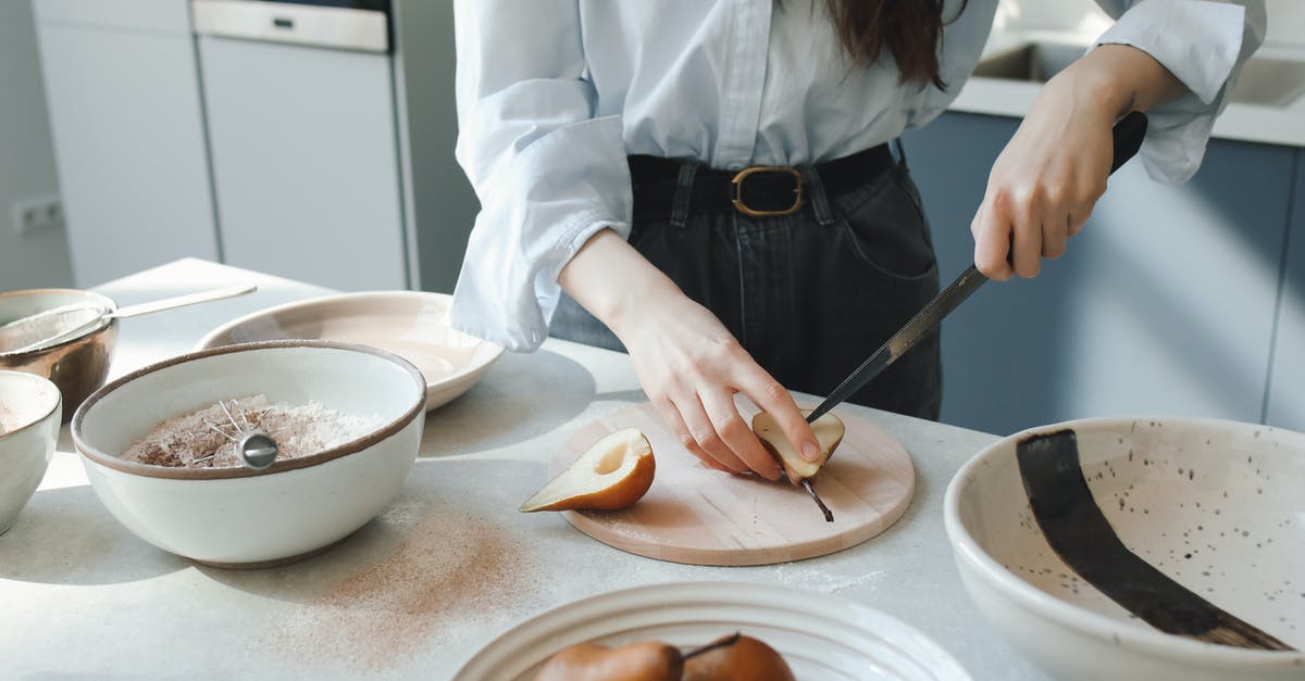 What are the limits on baking at 400F/200C? - Woman in White Long Sleeve Shirt Holding Chopsticks