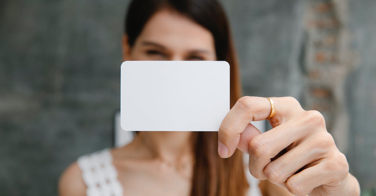 What are the positive effects of adding celery to a sauce? - Young blurred female showing white blank business card and looking at camera in light room